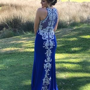 Selling blue prom dress with a slit in the front with a built in bra!